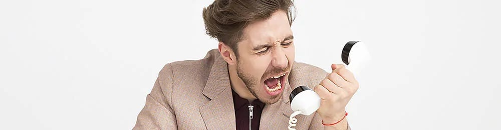 Man yelling in phone