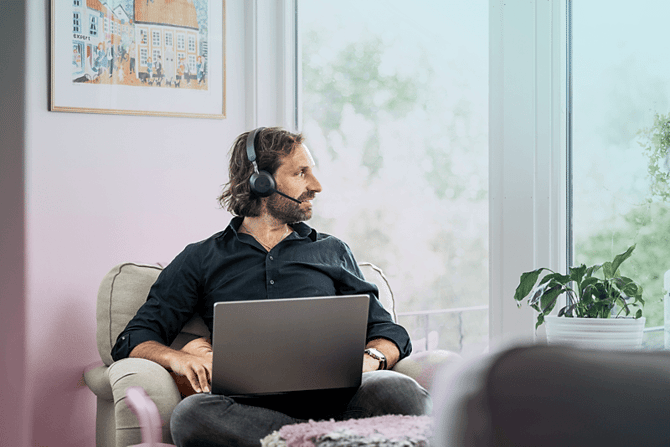 home-man-caucasian-laptop-headset-looking-out-window-dstnyjpg