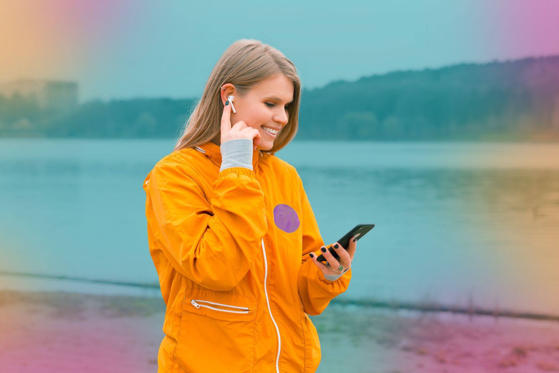 woman-orange-jacket-mobile-headphonespsd